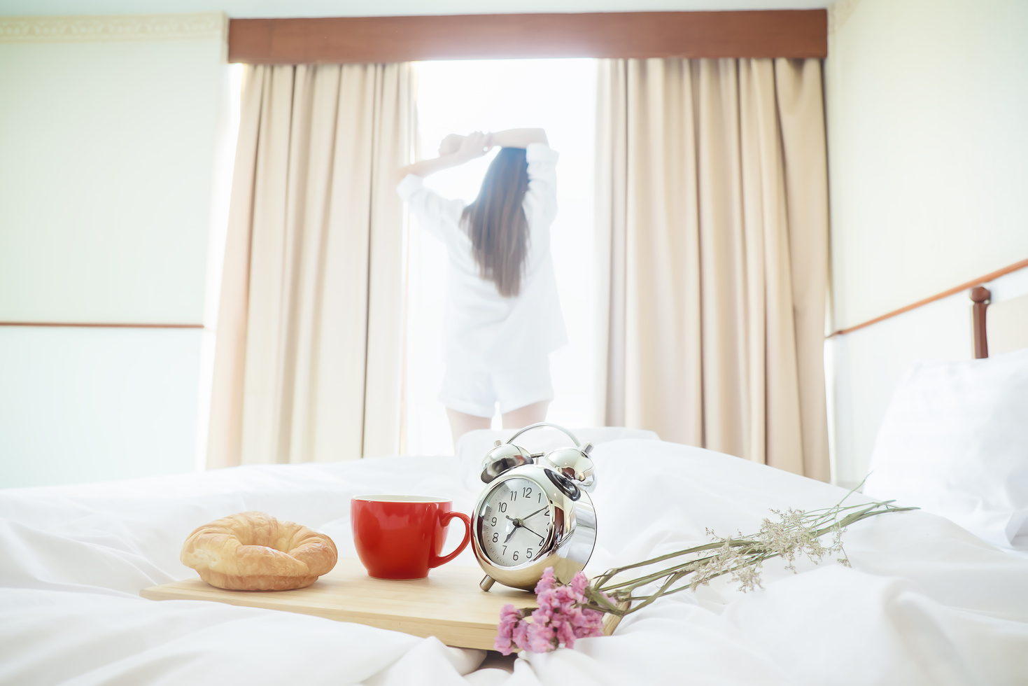 Breakfast in Bed with Woman near the Window