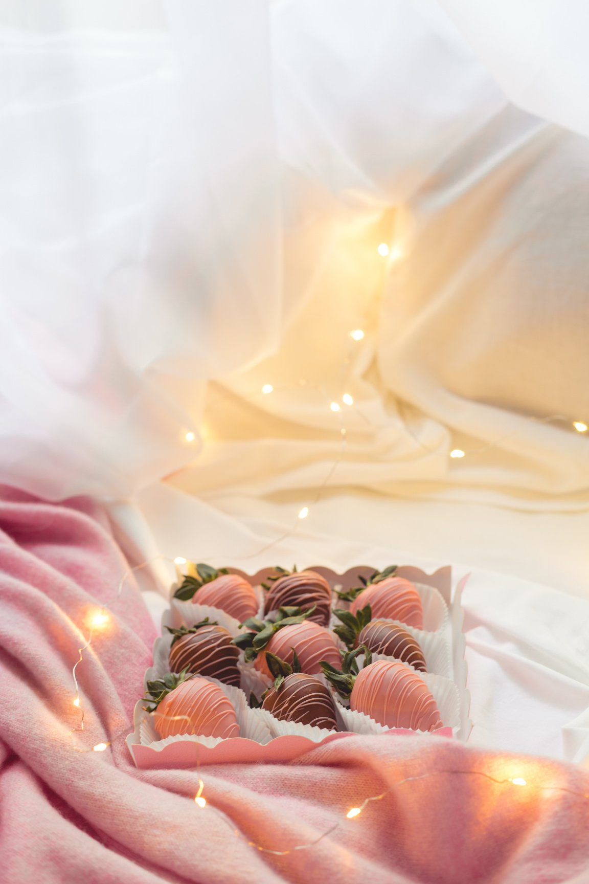 Chocolate Covered Strawberry on Top of Textiles